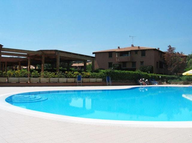 Swimming pool, sunbed