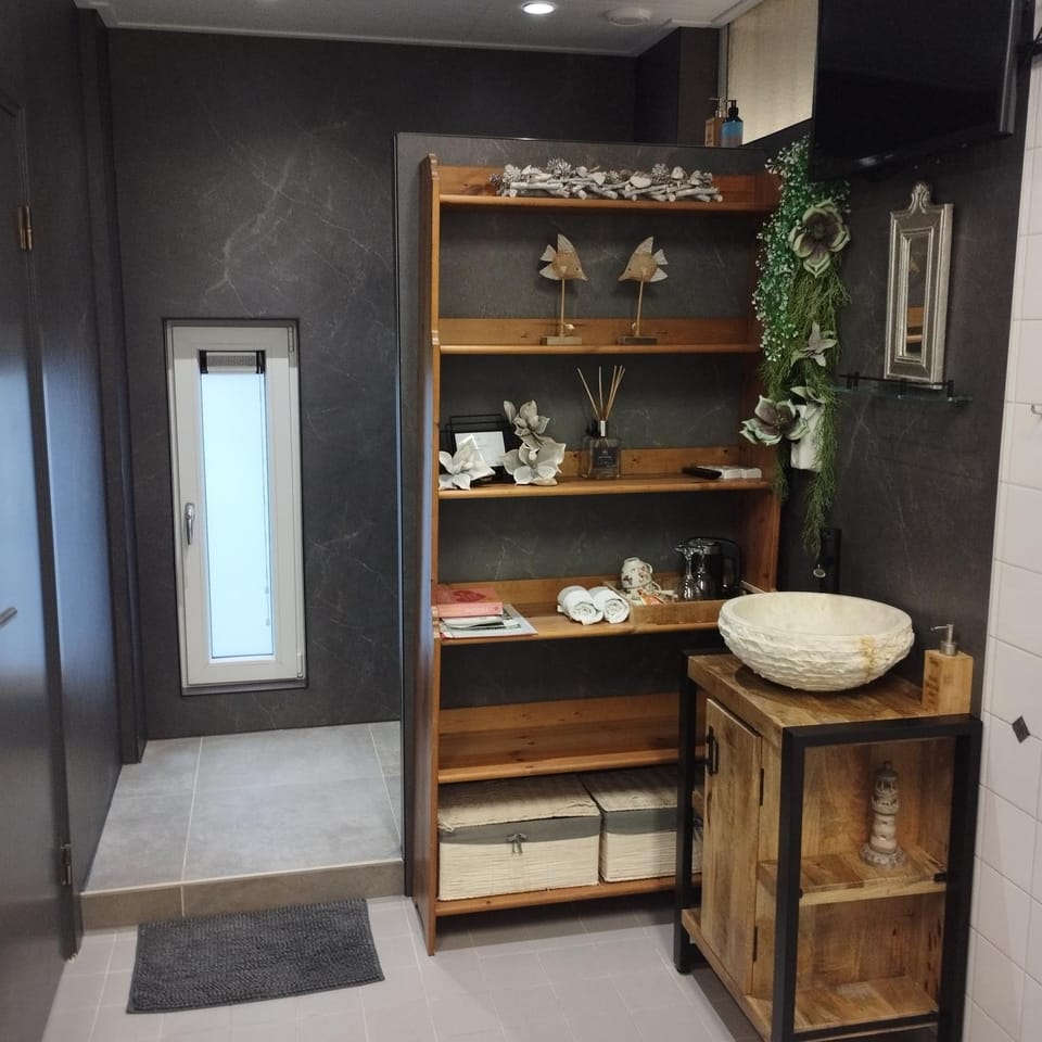 Voormalige Gevangenis Cel bij B&B Gezond aan Zee - Toegang Wellnesstuin meerprijs Bed and Breakfast in Ouddorp