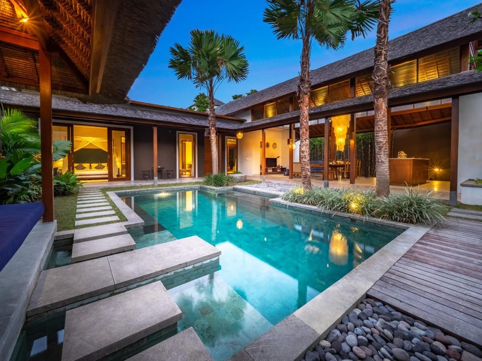 Property building, Patio, Pool view, Swimming pool, sunbed