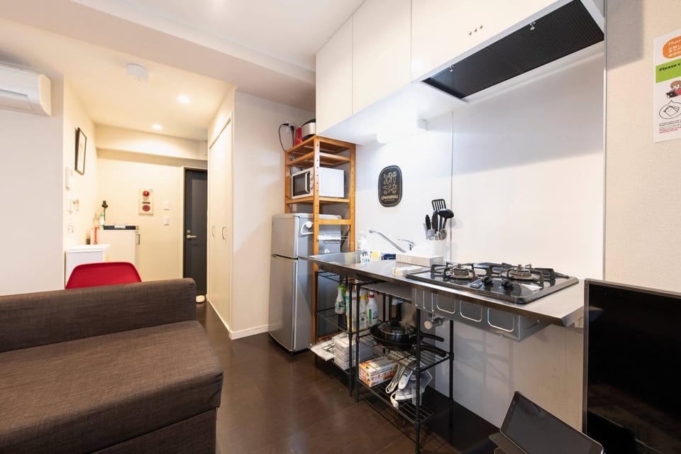 Kitchen or kitchenette, Seating area, minibar, stove