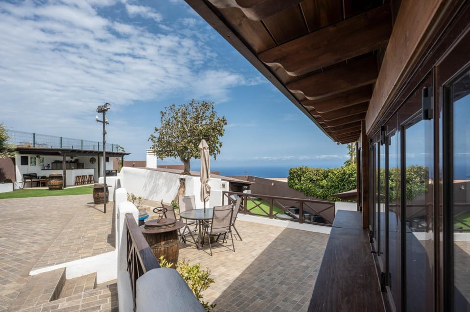Property building, Patio, Day, Natural landscape, View (from property/room), Balcony/Terrace, Living room, Seating area, Dining area, Sea view