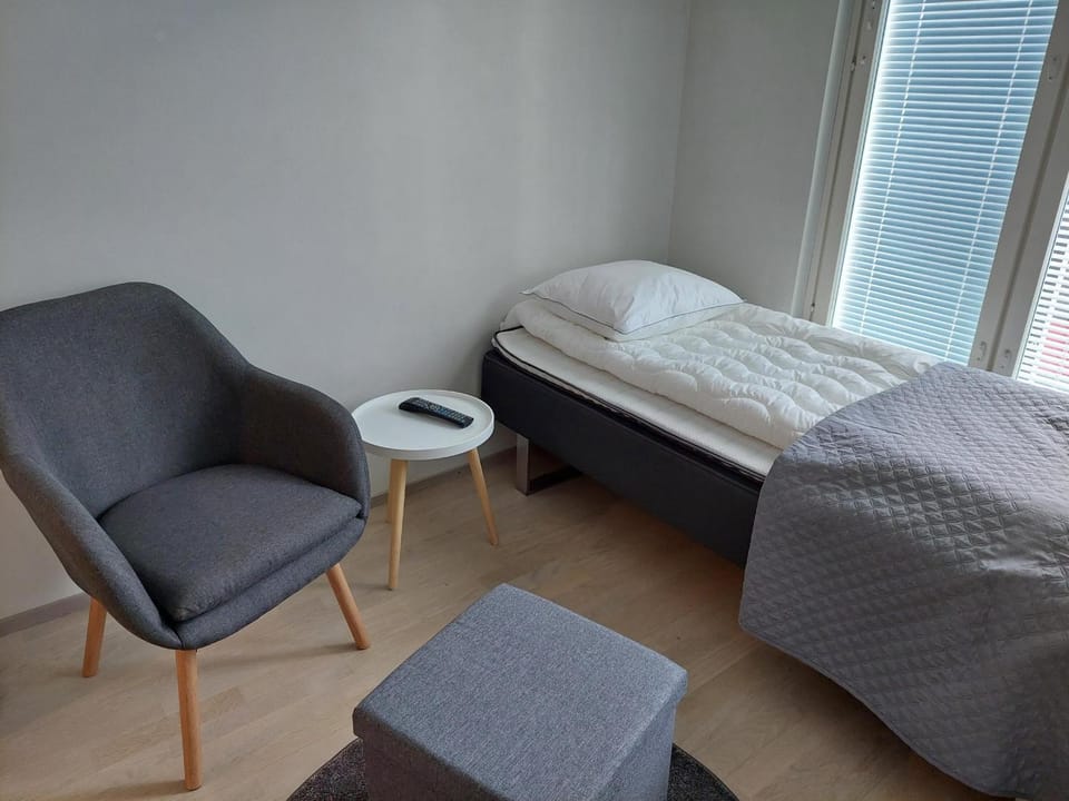 Best location studio in town right next to the train station and free parking Kotimaailma Apartments Apartment in Finland