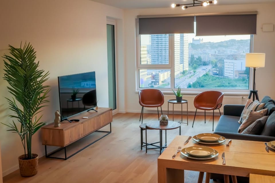 TV and multimedia, View (from property/room), Living room, Seating area, Dining area, City view