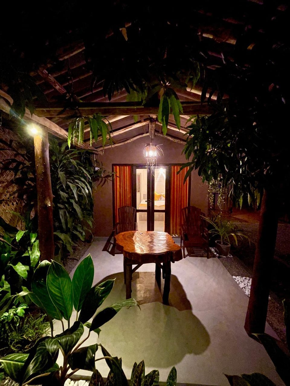 Patio, Night, Living room, Seating area, Dining area, Garden view