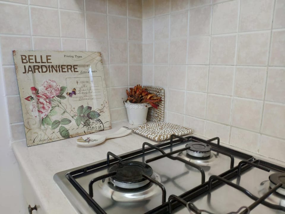 Kitchen or kitchenette, stove