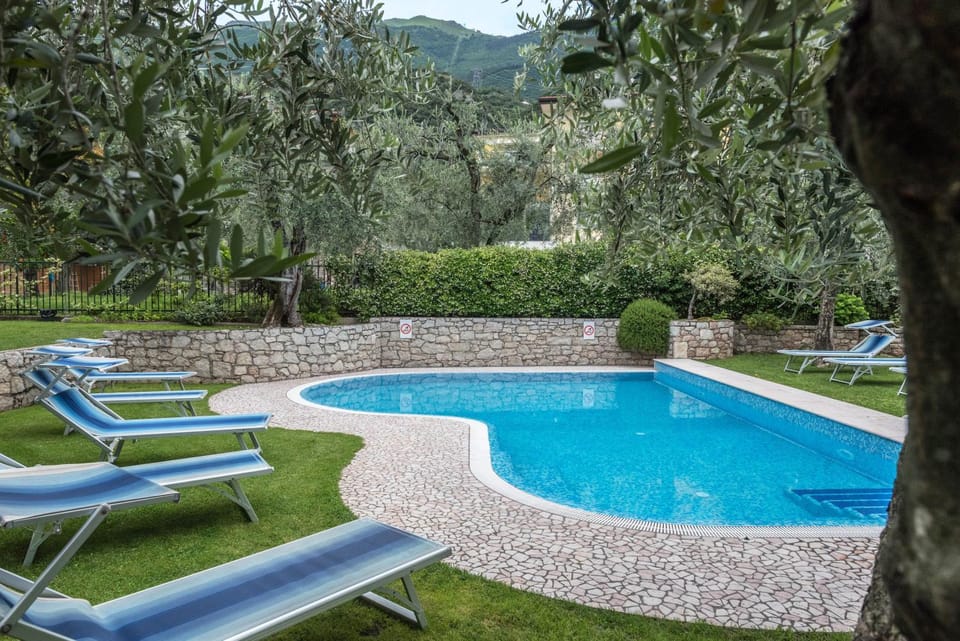 Property building, Living room, Swimming pool