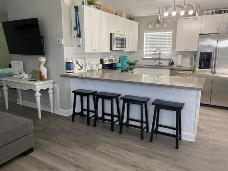 Kitchen or kitchenette, Dining area, dishwasher, minibar, pet friendly, stove, toaster