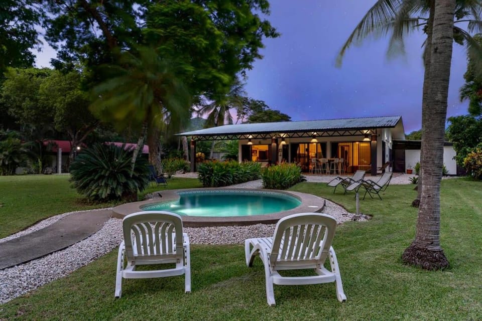 Stunning Gated Property with a Lush Garden, Wrap-Around Terrace & Private Pool House in Guanacaste Province