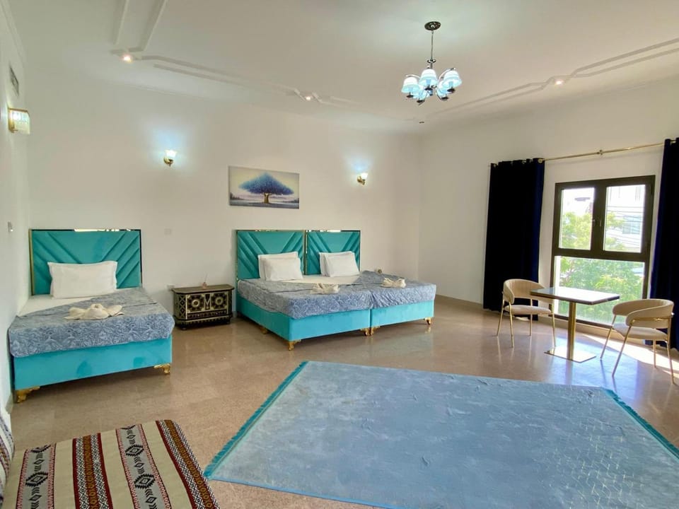 Bed, Seating area, Bedroom