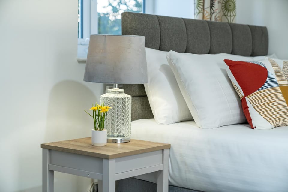 Bed, Living room, Seating area, Bedroom