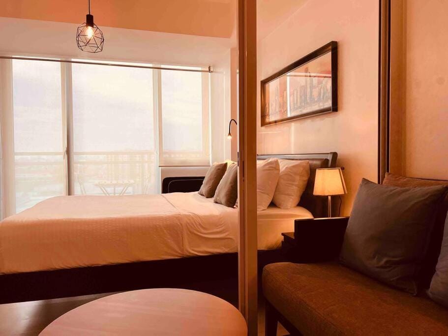 Bed, Living room, Seating area
