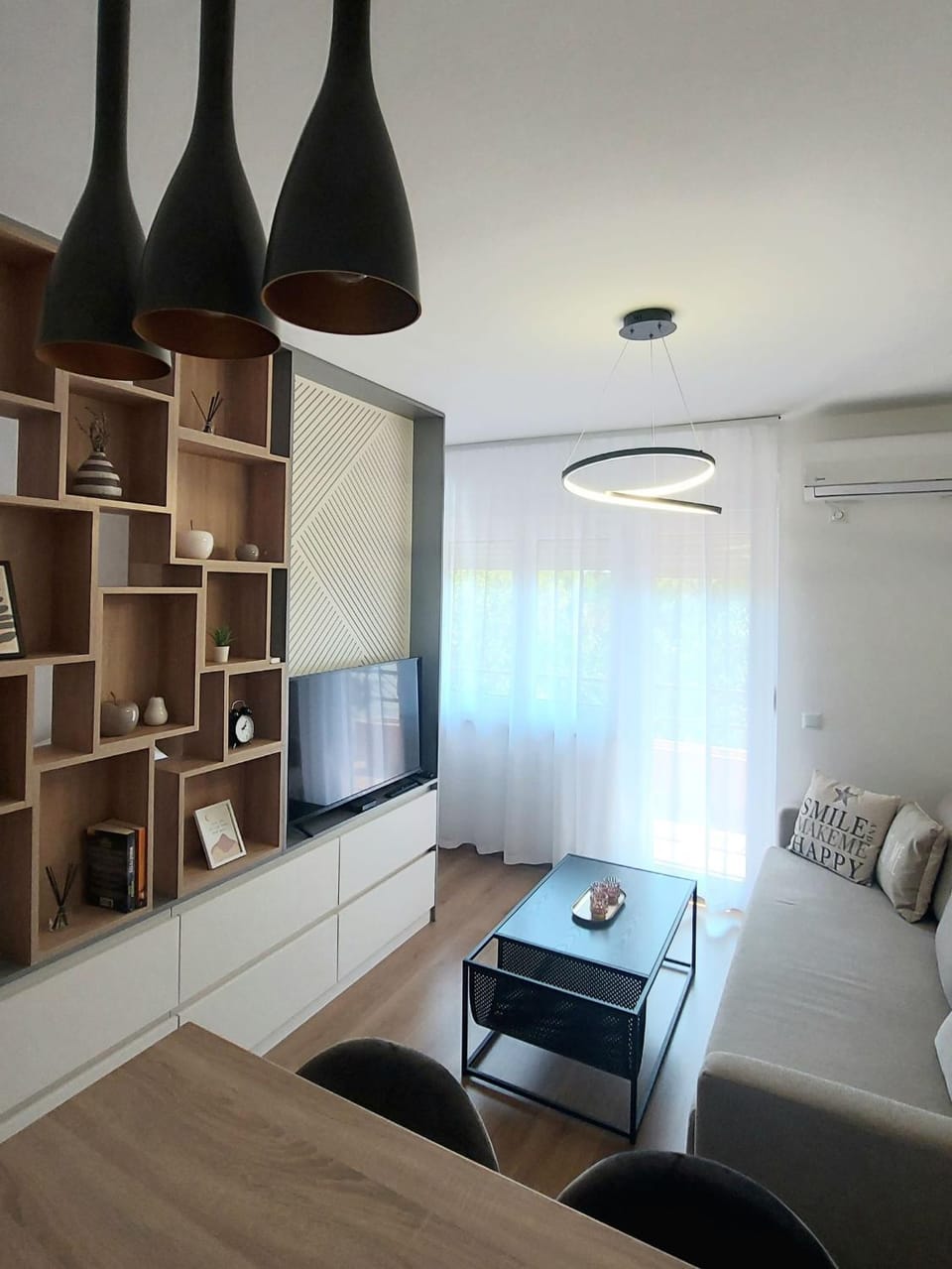 Communal lounge/ TV room, Living room, Seating area, air conditioner