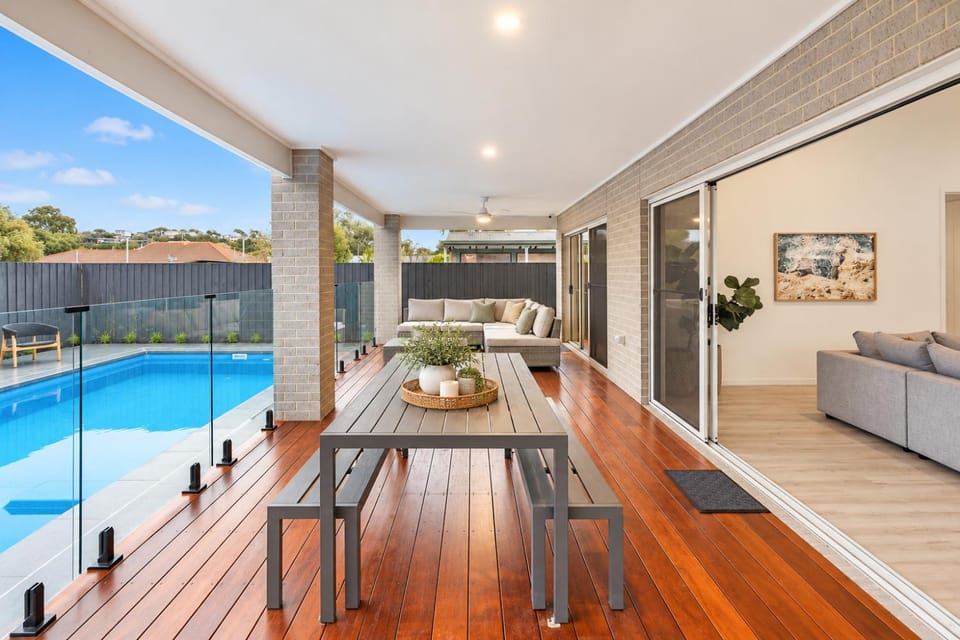 Patio, Seating area, Dining area, Pool view, Swimming pool