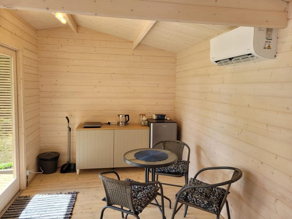 Kitchen or kitchenette, Seating area, Dining area, hair dresser, air conditioner