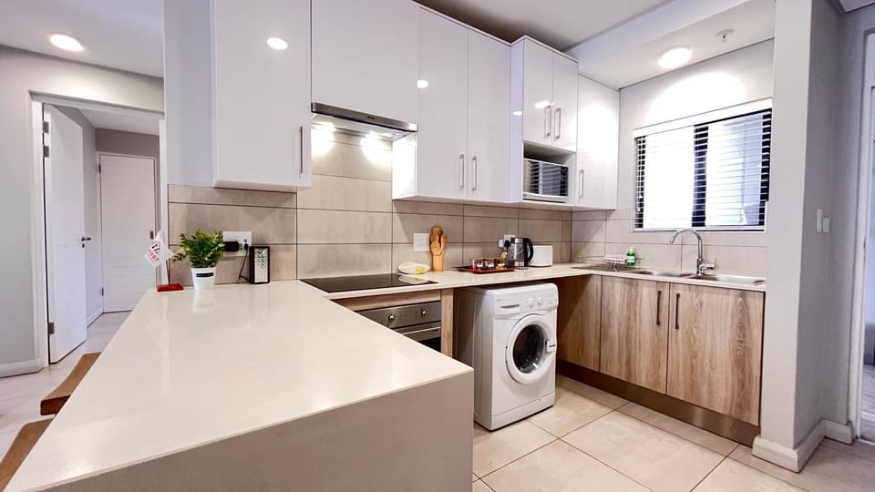 Kitchen or kitchenette, washing machine