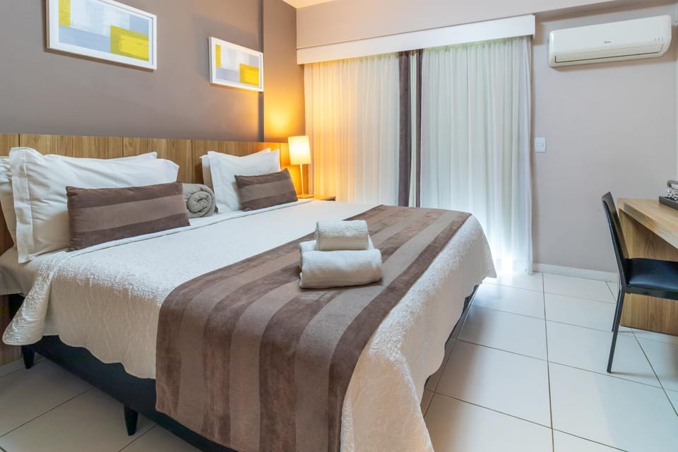 Photo of the whole room, Bedroom, towels, air conditioner