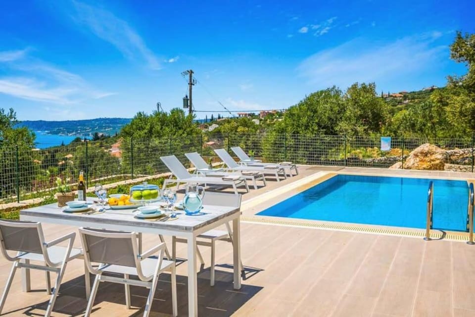 Patio, Pool view, Sea view, Swimming pool, sunbed