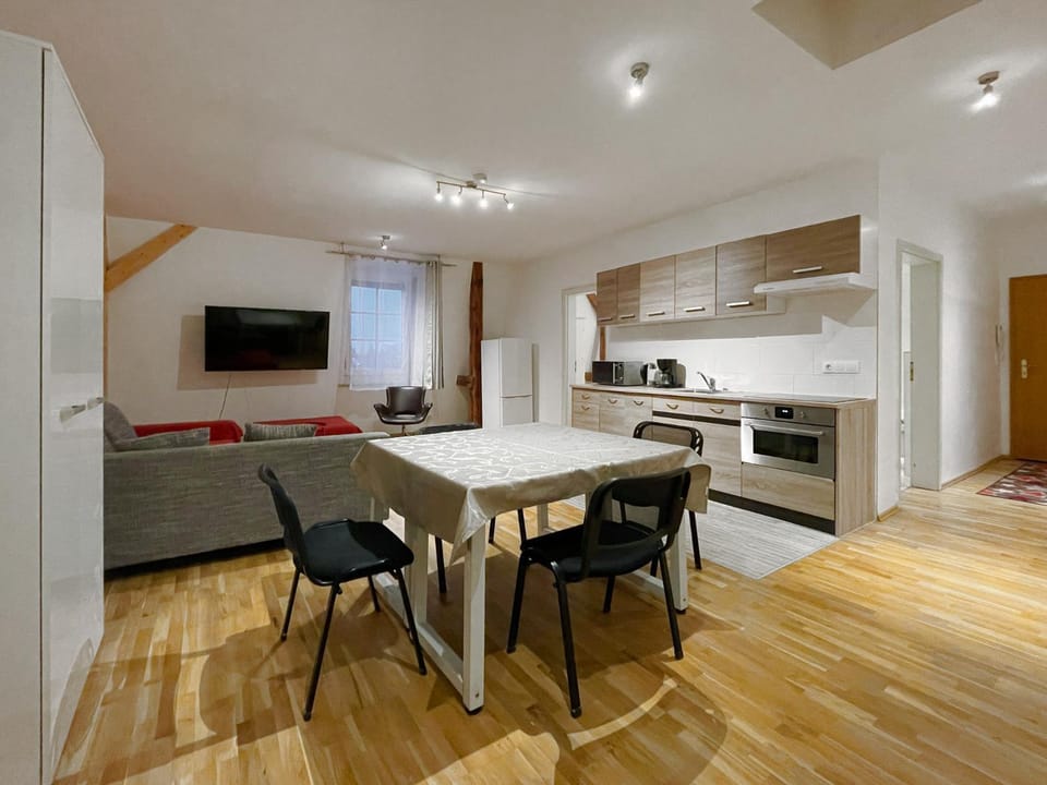 Kitchen or kitchenette, Living room, Seating area, Dining area