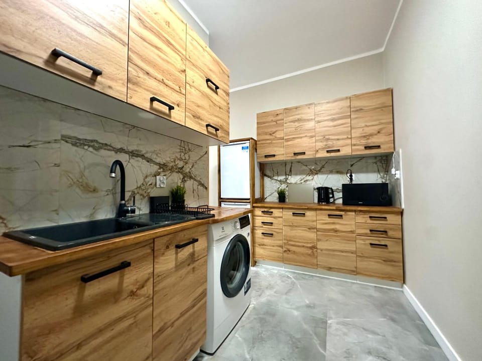 Coffee/tea facilities, Kitchen or kitchenette, minibar, stove, washing machine