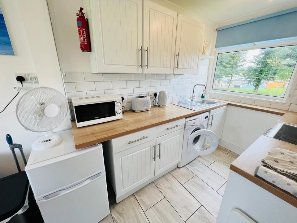 Coffee/tea facilities, Kitchen or kitchenette, minibar, toaster, washing machine