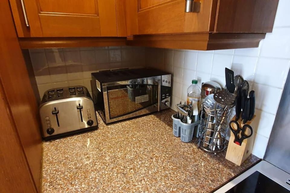 Kitchen or kitchenette, toaster