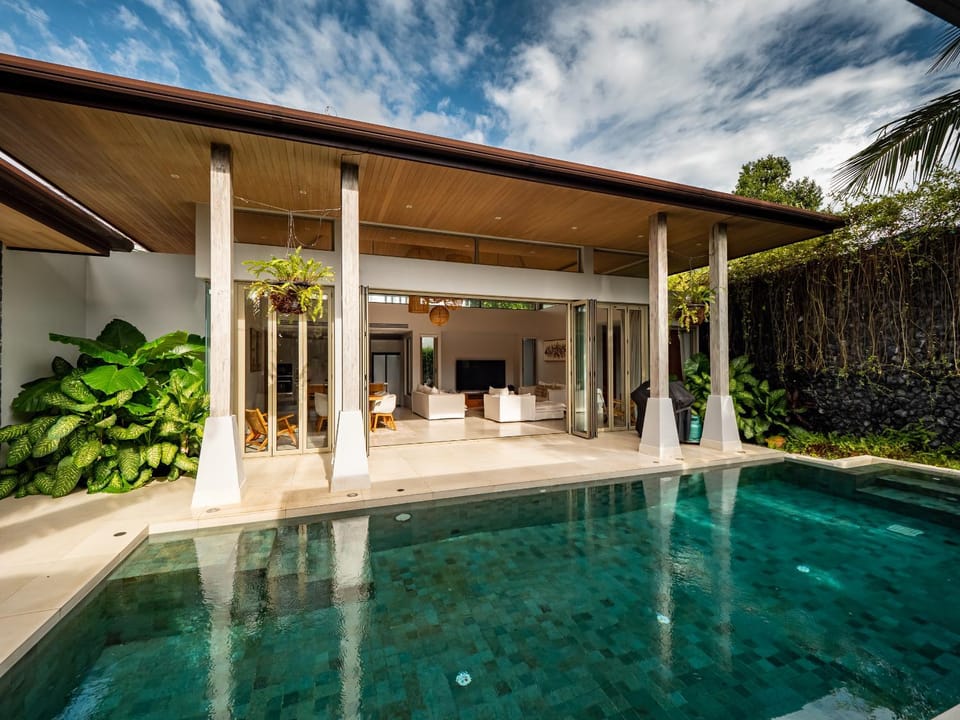 Property building, Patio, Facade/entrance, Day, Natural landscape, Pool view, Swimming pool