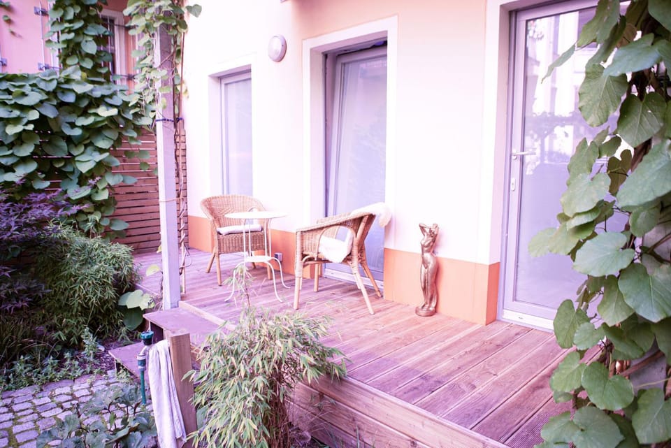 Property building, Patio, Spring, Day, Garden, View (from property/room), Balcony/Terrace, Living room, Seating area, Dining area, Garden view