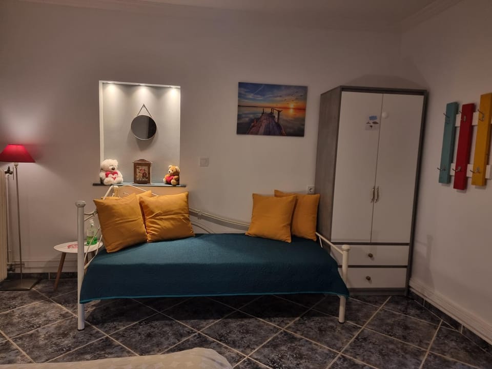 Bed, Living room, Seating area, Bedroom
