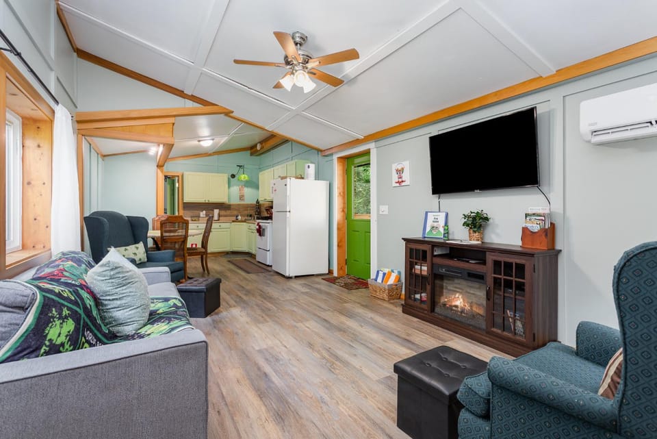 Living room, fireplace, microwave, oven, stove, kitchen