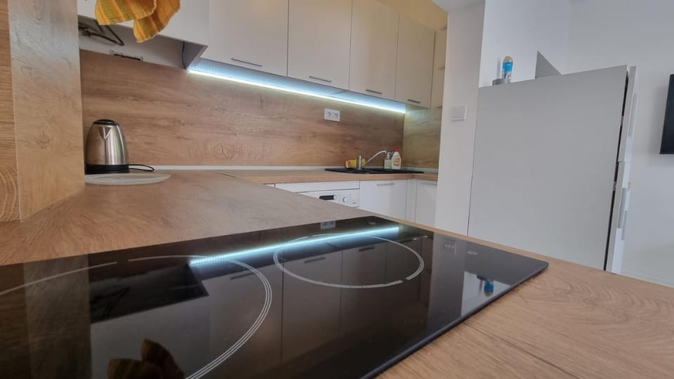 Kitchen or kitchenette, stove