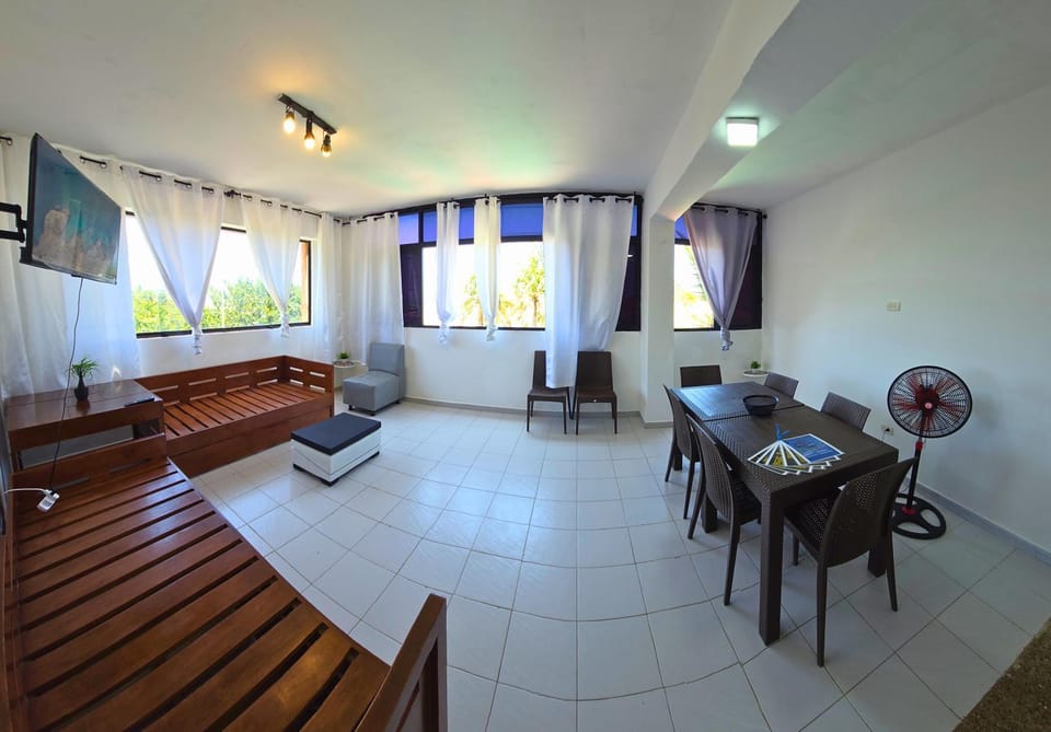TV and multimedia, Living room, Seating area, Dining area, Sea view