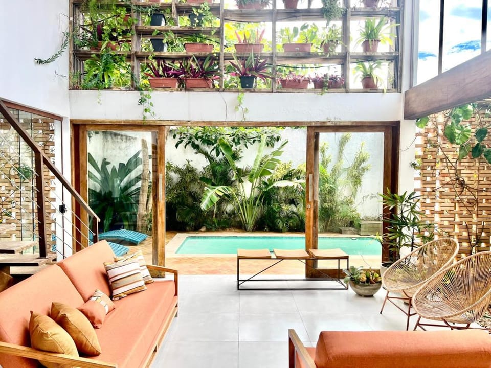 Natural landscape, Living room, Seating area, Garden view, Pool view