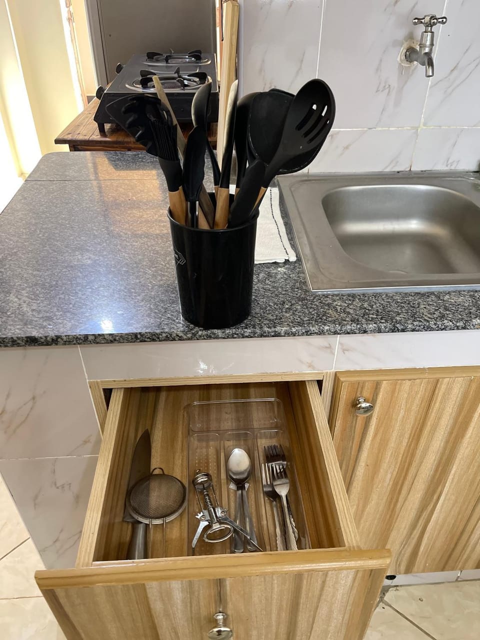 Kitchen or kitchenette, stove
