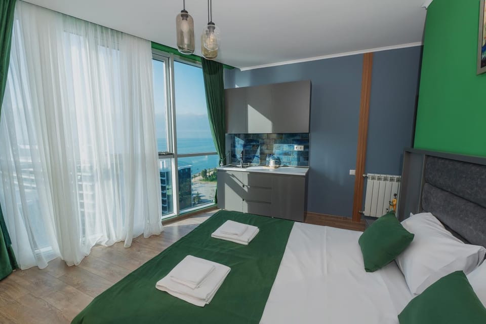 Bed, Sea view, towels