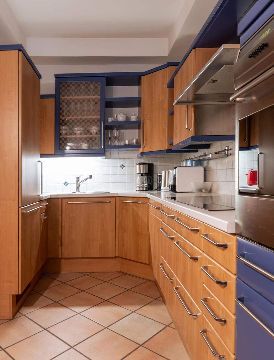 Kitchen or kitchenette, dishwasher, oven, stove