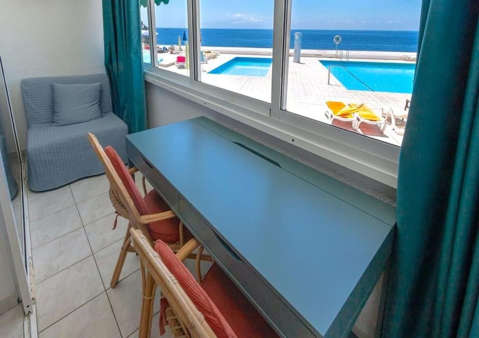 View (from property/room), Balcony/Terrace, Seating area, Pool view, Sea view