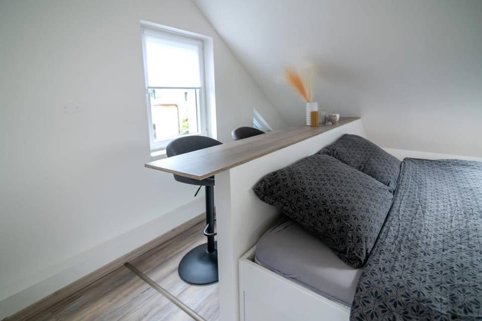 Bed, Living room, Seating area, Bedroom