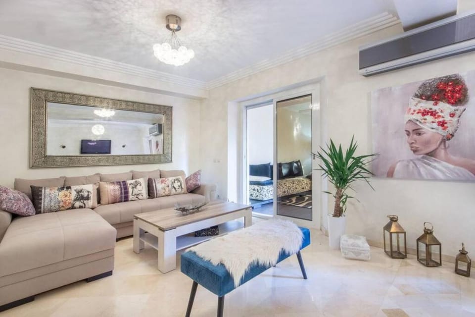 Bed, TV and multimedia, Living room, Seating area, Bedroom, air conditioner