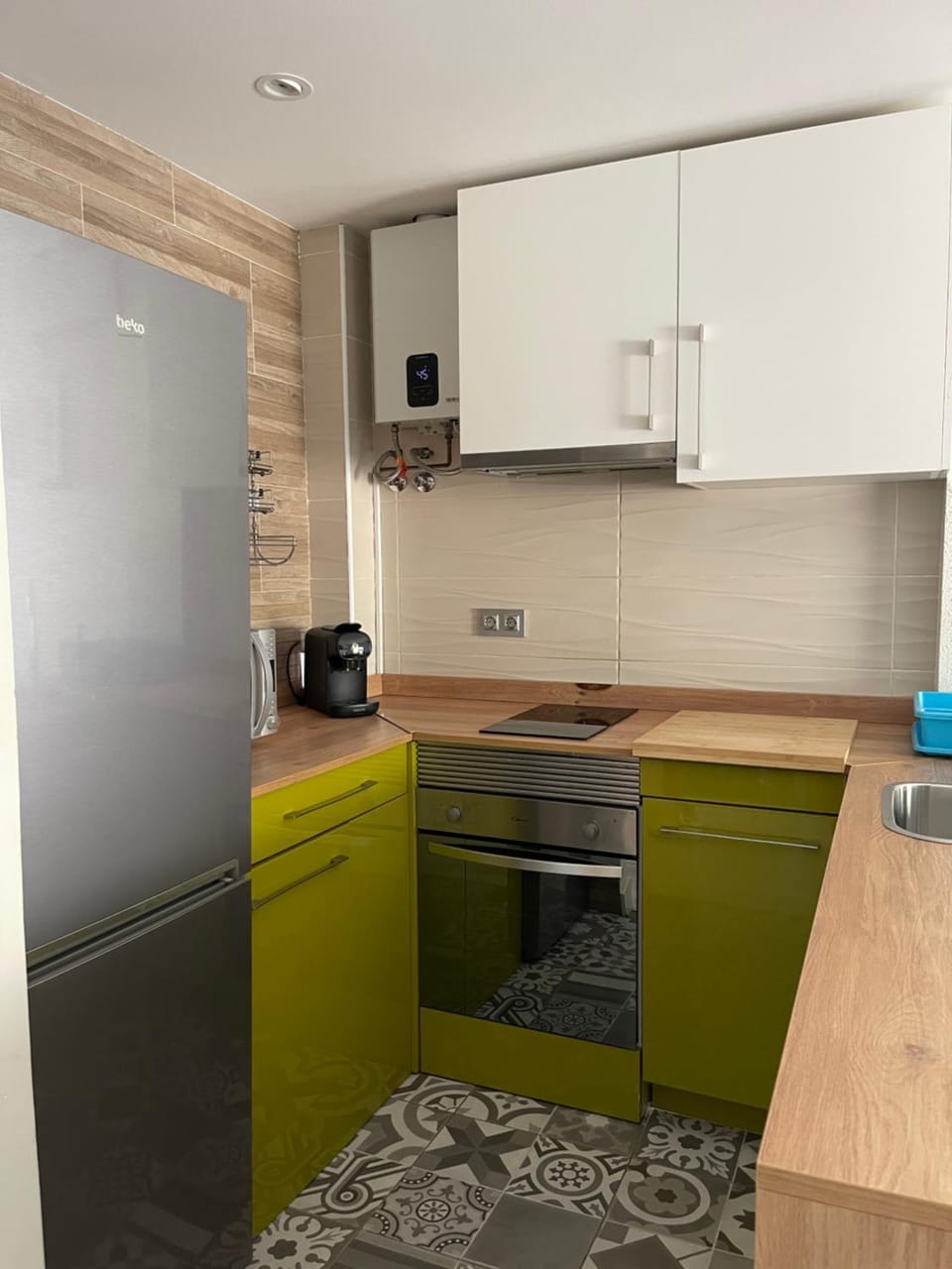 Kitchen or kitchenette, dishwasher, oven, stove, toaster