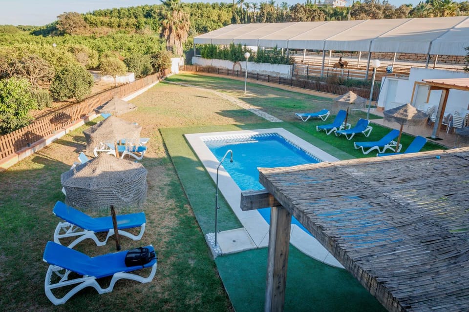 Property building, Living room, Swimming pool