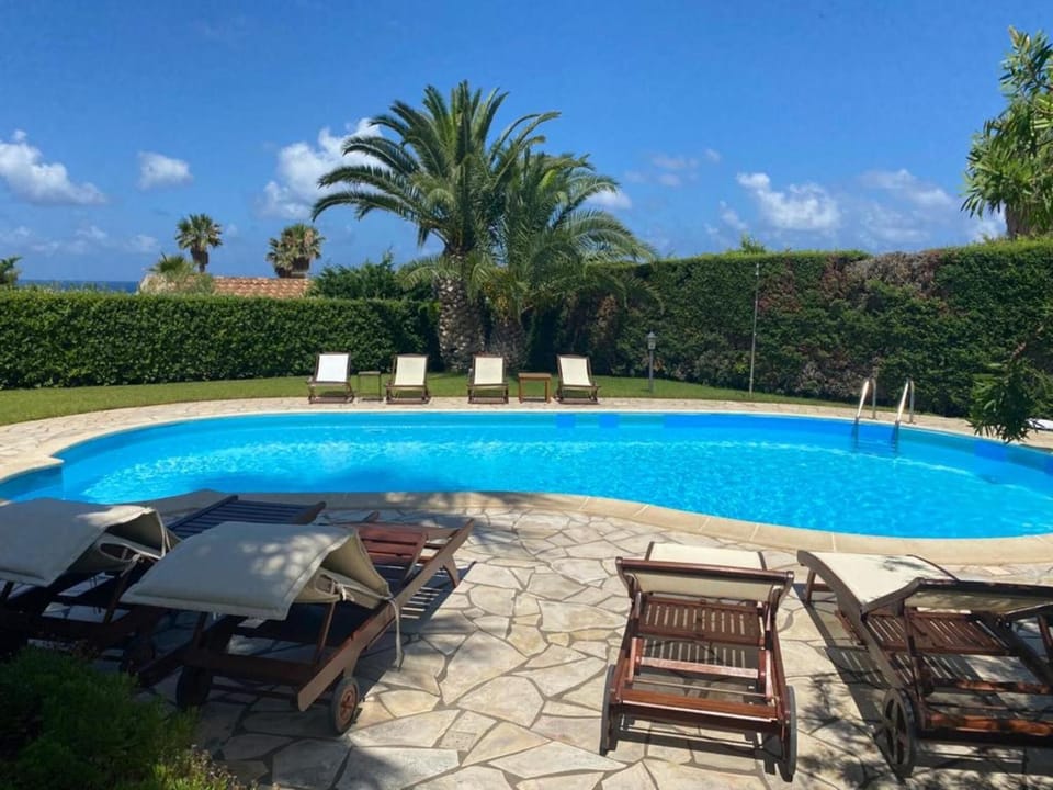 Property building, Living room, Swimming pool