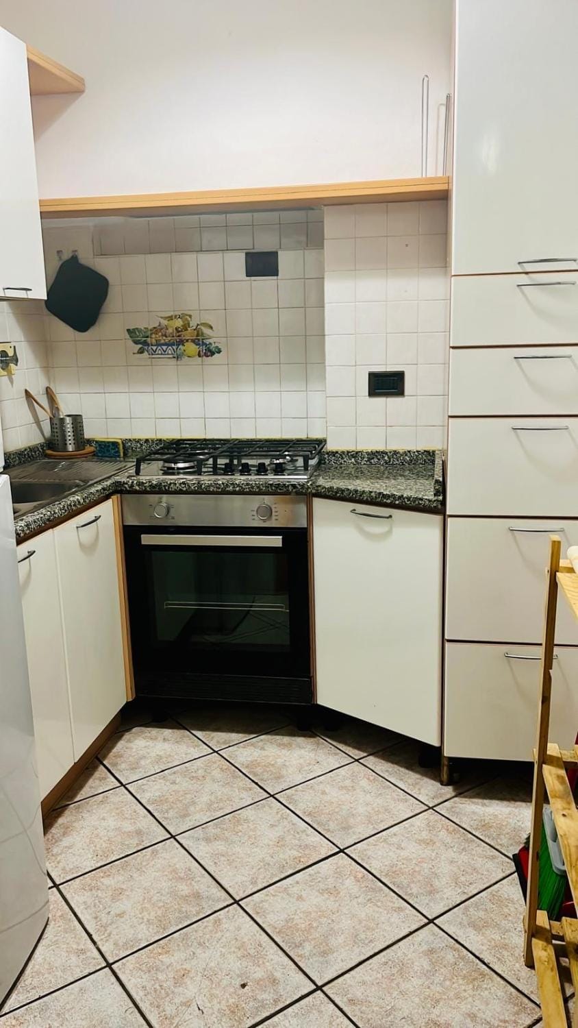 Kitchen or kitchenette, oven, stove
