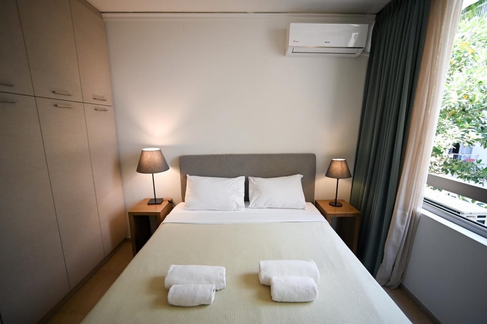 Bed, Photo of the whole room, Bedroom, towels, air conditioner