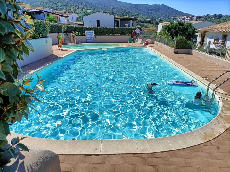 Property building, Living room, Swimming pool