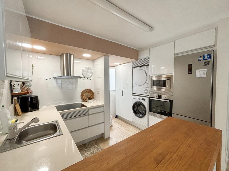 Kitchen or kitchenette, Dining area, oven, stove, toaster, washing machine, dryer, kitchen, air conditioner