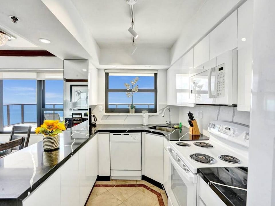 Kitchen or kitchenette, oven, stove