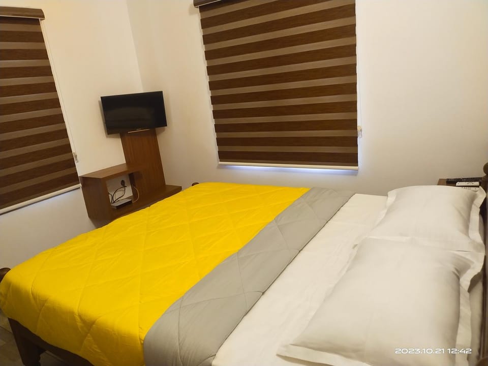 Family Cottage at Merlys Fruit Garden, Thattekkad House in Kerala