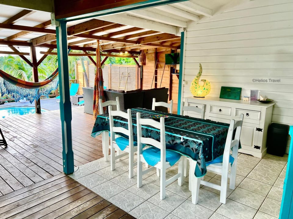 Patio, View (from property/room), Balcony/Terrace, Living room, Seating area, Dining area, Pool view, Swimming pool, sunbed