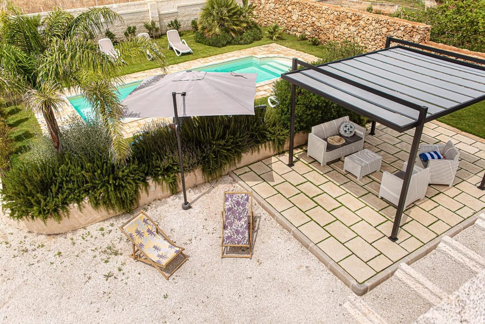 Patio, Day, Garden, Pool view, Swimming pool, sunbed