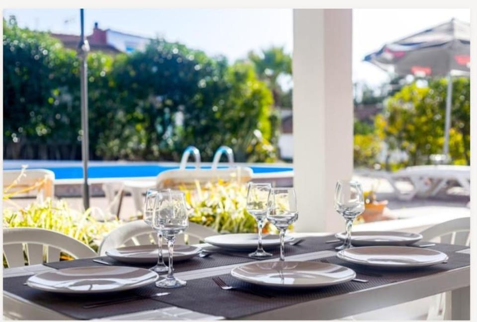 Patio, Dining area, Pool view